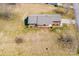 Expansive aerial view of a ranch-style home with a well-manicured lawn and mature trees at 19 Harolds Ct, Taylorsville, NC 28681