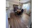 Dining room features a chandelier and views of the yard at 19 Harolds Ct, Taylorsville, NC 28681