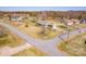 Street view of a home with brick exterior, garage and a well-manicured lawn and landscape at 19 Harolds Ct, Taylorsville, NC 28681