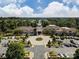 Aerial view of the community clubhouse, lush landscaping, and parking area at 2018 Links View Dr, Fort Mill, SC 29707