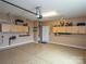 Clean garage featuring a sealed floor, storage cabinets, and ample space for parking and projects at 2018 Links View Dr, Fort Mill, SC 29707