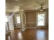 Inviting living room features hardwood floors, neutral paint, and abundant natural light at 222 2Nd Ave, Albemarle, NC 28001