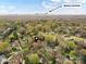 A high aerial shot of Charlotte, NC with the city skyline in the distance showcasing nearby Uptown Charlotte at 2411 Calais Pl, Charlotte, NC 28211