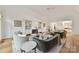 Cozy living room featuring hardwood floors, a fireplace and an open concept layout with great light at 2411 Calais Pl, Charlotte, NC 28211