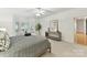 Large main bedroom with neutral walls, carpet, and a view of the backyard at 2411 Calais Pl, Charlotte, NC 28211