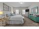 Spacious main bedroom featuring soft carpet, a TV, and an ensuite bathroom at 250 Kerri Dawn Ln, Locust, NC 28097