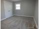 Bedroom featuring a closet, window and neutral carpeting and wall color at 2739 Great Falls Hwy, Lancaster, SC 29720