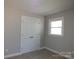 Bedroom featuring a closet, window and neutral carpeting and wall color at 2739 Great Falls Hwy, Lancaster, SC 29720