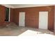 Spacious garage with brick walls, white doors, and finished ceilings at 2739 Great Falls Hwy, Lancaster, SC 29720