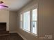 Living room boasts bright windows and neutral walls with a fireplace on the left at 2739 Great Falls Hwy, Lancaster, SC 29720