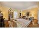 Inviting living room with yellow walls, hardwood floors, fireplace and classic decor at 318 S Canterbury Rd, Charlotte, NC 28211