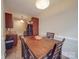 Dining area with wood table set and view into the kitchen area at 3253 Ian Patrick Ave, Kannapolis, NC 28083