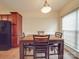 Dining area with seating for four, natural light, and tile flooring at 3253 Ian Patrick Ave, Kannapolis, NC 28083