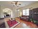 Open-concept living room with view of the dining area, lots of light, and cozy seating at 3253 Ian Patrick Ave, Kannapolis, NC 28083