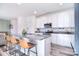 Bright kitchen with granite countertops, island seating and stylish cabinets at 345 Corinth Church Rd, Mooresville, NC 28115