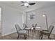 Bright bedroom space features a modern desk, seating, a ceiling fan, and a window view at 356 Hill Rd, Lincolnton, NC 28092