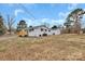 Charming single-story home featuring a new wooden deck and a freshly painted white exterior at 356 Hill Rd, Lincolnton, NC 28092