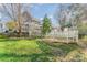 View of backyard with fire pit, large yard, and exterior of home at 3601 Rosedown Dr, Matthews, NC 28105