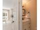 Bathroom featuring a vanity with granite countertop and decorative mirror at 3601 Rosedown Dr, Matthews, NC 28105