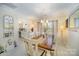 Dining room with wood table and views into Kitchen at 3601 Rosedown Dr, Matthews, NC 28105