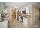 Charming kitchen featuring stainless steel appliances and access to dining area at 3601 Rosedown Dr, Matthews, NC 28105