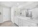 Bathroom featuring dual sinks, a large mirror, and a glass-enclosed shower at 367 Kennerly Center Dr, Mooresville, NC 28115