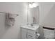 This bathroom features a vanity, a single sink and tile floors at 3750 Ellington St, Charlotte, NC 28211