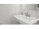 Bathroom featuring a sink with chrome faucet and tile surround bathtub at 3750 Ellington St, Charlotte, NC 28211