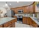 Modern kitchen with stainless steel appliances, granite countertops, and abundant cabinet space at 4119 Flint Dr, Lancaster, SC 29720