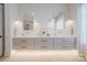 Bright bathroom featuring a double sink vanity, neutral color palette, and modern fixtures at 412 Bertonley Ave, Charlotte, NC 28211