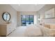 Bright main bedroom with a sliding glass door to the exterior, a dresser, and stylish furnishings at 412 Bertonley Ave, Charlotte, NC 28211