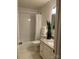 Bathroom featuring granite vanity and shower with subway tile at 4520 Central Ave # C, Charlotte, NC 28205