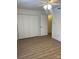 Bedroom with closet and wood-look flooring at 4520 Central Ave # C, Charlotte, NC 28205