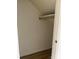 Walk in closet with a single shelf and modern flooring at 4520 Central Ave # C, Charlotte, NC 28205