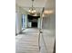 Open floor plan featuring modern kitchen appliances and ample lighting next to patio at 4520 Central Ave # C, Charlotte, NC 28205