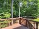 A view from the deck of the lush backyard and the surrounding wooded area, perfect for outdoor relaxation at 4708 Pearmain Dr, Waxhaw, NC 28173