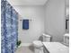 Bathroom featuring white walls, tiled floors, a blue shower curtain, and a mirror at 49 Orchard Trace Ct, Taylorsville, NC 28681