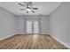 Bedroom with hardwood floors and a glass door leading to a balcony at 49 Orchard Trace Ct, Taylorsville, NC 28681