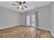 Bedroom with hardwood floors and a glass door leading to a balcony at 49 Orchard Trace Ct, Taylorsville, NC 28681