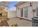 This small backyard patio features a white fence, a shed and flowers in decorative pots at 49 Orchard Trace Ct, Taylorsville, NC 28681