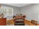 Cozy bedroom with hardwood floors, natural light, and a warm, inviting atmosphere at 507 Saint Johns Dr, Salisbury, NC 28144