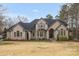 Stunning brick home featuring manicured landscaping, arched entryway, and a classic design at 507 Saint Johns Dr, Salisbury, NC 28144