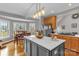 Bright kitchen with a large island, stainless steel appliances, and adjacent breakfast nook with lots of light at 507 Saint Johns Dr, Salisbury, NC 28144