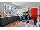 Charming kitchen with a mix of white and blue cabinets, stainless appliances, and an eye-catching oriental rug at 524 W Horah St, Salisbury, NC 28144