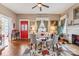 Bright living room with hardwood floors, fireplace, and a charming red door at 524 W Horah St, Salisbury, NC 28144