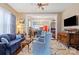 Cozy living room with open archway to the dining and kitchen areas, featuring hardwood floors at 524 W Horah St, Salisbury, NC 28144