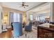 Comfortable living room showing open layout to the dining room, hardwood floors, and bright natural light at 524 W Horah St, Salisbury, NC 28144