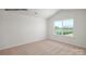 Bedroom with carpet floor features a large window overlooking the outdoors at 529 Trading Post Ln, York, SC 29745