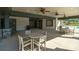 Outdoor patio with tables, chairs, and ceiling fans for relaxing and entertaining at 531 Trading Post Ln, York, SC 29745