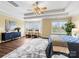 Bright bedroom features a bay window seating area, dark wood floors, and neutral walls at 5501 Two Iron Dr, Matthews, NC 28104